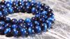 Picture of Tigerauge blau glatt, 6mm